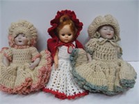 3 dolls in crocheted dresses