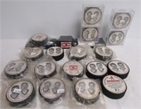 (18) Detroit Redwing hockey pucks with collector
