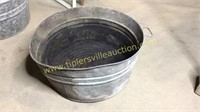 Bent wash tub with oil