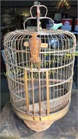 Antique caved birdcage 25in tall