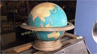 Vintage globe with metal stand