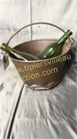 Copper bucket with bottles