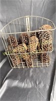 Metal wall basket with pine cones