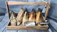 Old berry box with shoe stretchers and molds