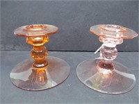 Pair of pink glass candleholders