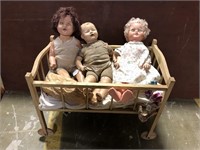 DOLL CRADLE WITH 3 DOLLS