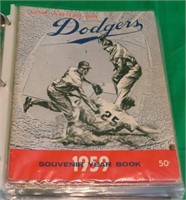 BINDER CONTAINING 14 DODGERS YEARBOOKS FROM