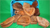 LOT OF 16 USED VINTAGE BASEBALL GLOVES. THIS LOT