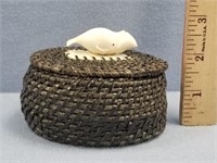Oval shaped baleen basket, with carved ivory whale