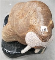 Michael Scott soapstone carving of a walrus with f