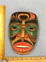 Carved wooden Tlingit style mask wall hanger, mans