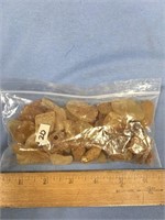 Bag of raw amber specimens        (k 182)