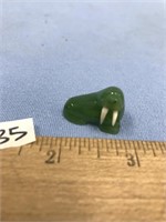 Tiny jade carving of a walrus with ivory tusks, 1"