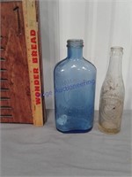 2 old bottles - blue & clear