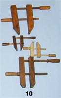 Four smaller wooden parallel clamps