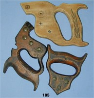 Three wooden saw handles
