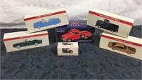 Group of small diecast cars and trucks