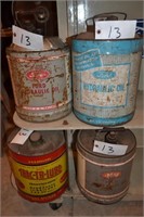 (4) 5 gallon oil cans