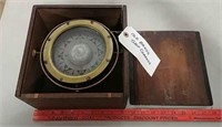 Brass ship's compass in wooden case