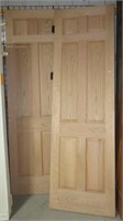 Pair of heavy 6 panel oak doors with hinges.