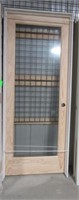 New wood door with glass panel and jamb. Jamb