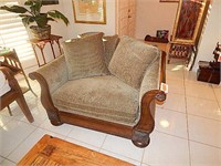 Upholstered side chair with wood base arms