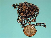 Antique unique rosary in metal case