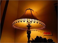 Table lamp with beaded shade
