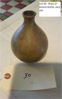 Brass or bronze heavy bottle old