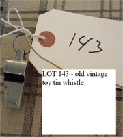 old vintage tin whistle