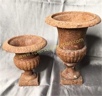 Pair of small iron urns tallest is 8in