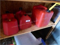 3 plastic gas cans
