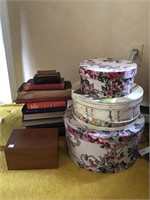 Lot of hat boxes and books