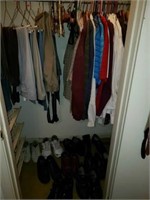 Closet full of men's clothing and shoes