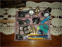 Estate lot of watches, belt buckles and more