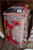 Lot of 8 bags ruby red mulch. 2 cubic feet each