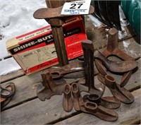 Assortment of cobbler's shoe stands and forms