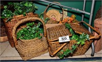 Assorted baskets and floral greenery.