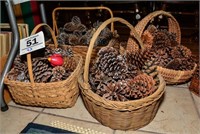 Set of 4  handled  baskets filled with pinecones