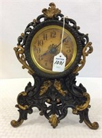 Ornate Iron Cherub Design Western Clock Mfg. Co