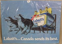 Labatt's Dog Sled poster, covered with plastic,