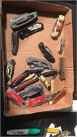 flat of miscellaneous pocket knives