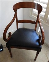 Mahogany open arm chair with scrolled arms and