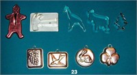 Lot: 9 cookie cutters and little copper candy mold