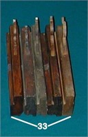 Five wooden molding planes