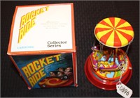 Rocket Ride Wind-up Toy, New.