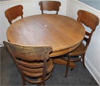 Oak Table w/Four Chairs.