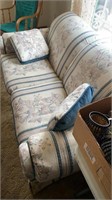 A very nice loveseat that has a matching love