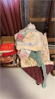 A box lot of kitchen towels hand knitted items