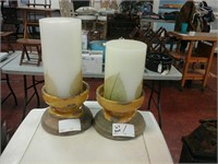Pair of candles with candle stands